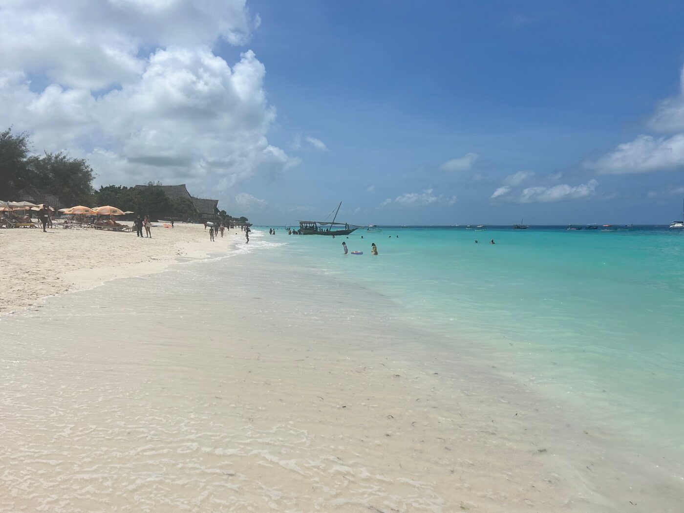 Dhows and sun loungers on the sand at Nungwi