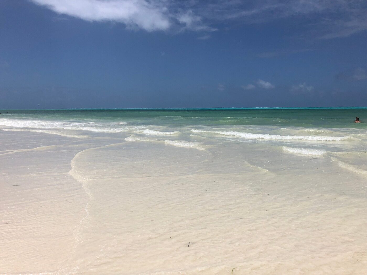 White sand and turquoise shallows at Paje