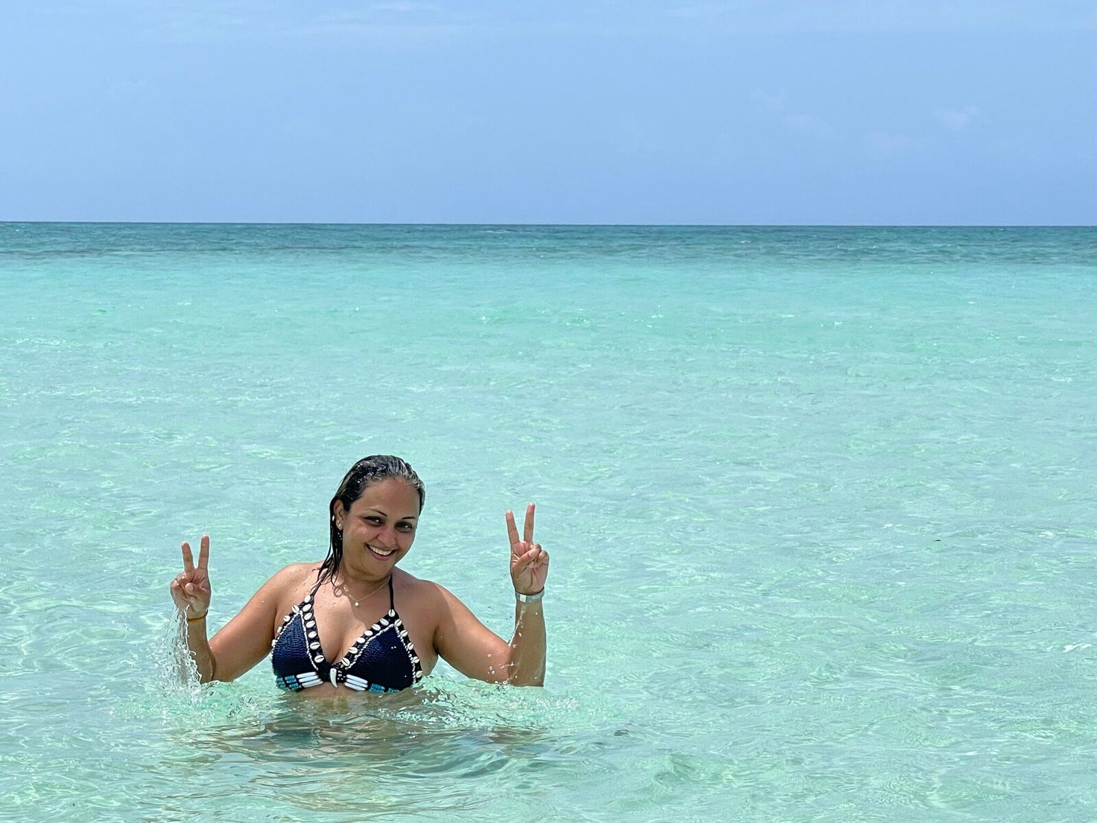 Traveler relaxing safely in the turquoise Zanzibar sea