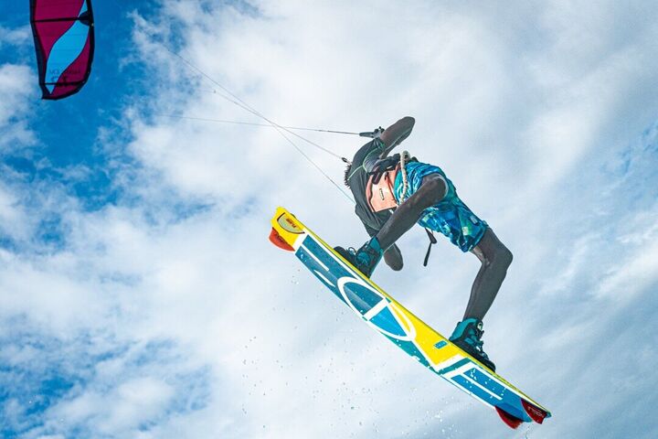 A kitesurfer over the lagoon at Paje
